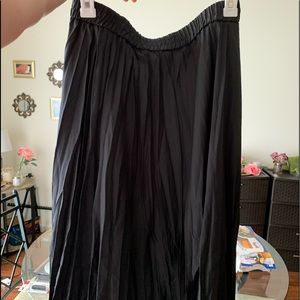 Calf length black pleated pull on skirt size medium